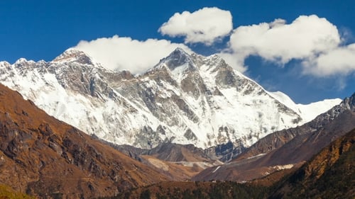 Mountain with Clouds Moving and Snow