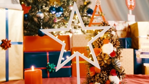 Festive Christmas Decoration with Gifts and Candle Light