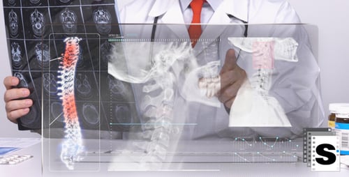 Doctor Examining Medical Scans on Holographic Computer Display