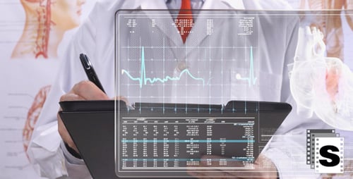Doctor Looking Cardiogram