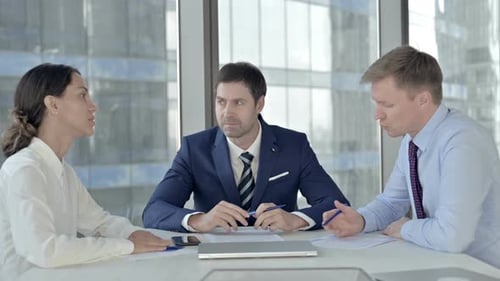 Businesspeople Meeting to Discuss Financial Strategies