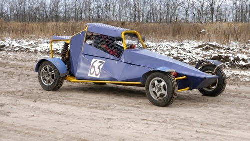 Custom-Built Race Car Parked on Dirt Track
