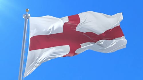 England Flag Waving in the Wind against Blue Sky