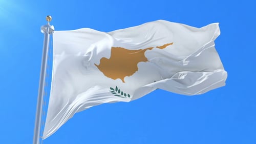 Cyprus Flag Waving in Wind Against Blue Sky