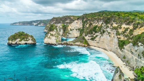 Rocky Coast with Big Waves at Atuh Beach on Nusa Penida Island, Indonesia