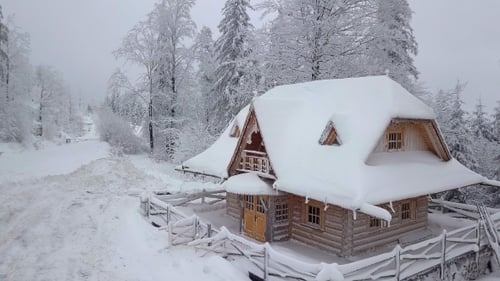 Snowy Cabin in the Winter Wilderness