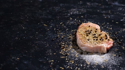 Raw Seasoned Meat with Rosemary and Pepper