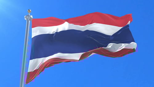 Waving Thailand Flag Against Clear Blue Sky