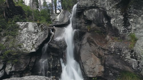 Powerful Mountain Cascade Waterfall in the Forest