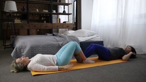 Positive Women Exercising Doing Sit-ups at Home