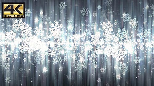 Sparkling Snowflakes Falling with Abstract Light Rays Background