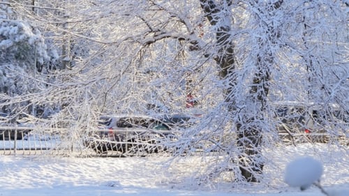 Cars Go on the Road After Snowfall