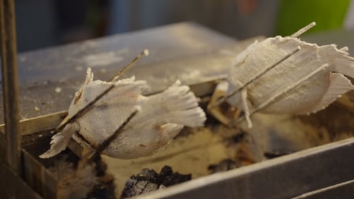 Asian Street Food Fish Roasting on the Grill