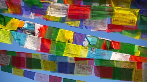 Buddhist Prayer Flags Wave in the Wind