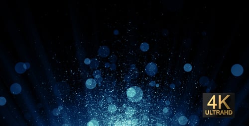Blue Shimmering Glitter Particles and Bokeh Lights Background