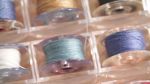 Close Up of Spools of Colorful Sewing Thread