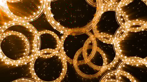 Golden Sparkling Rings Celebration Loop Background