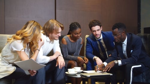 Business Colleagues Meeting to Discuss Work in Office