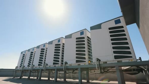 An Air Conditioning System of Six Air Conditioners is Located on the Roof of the Business Center