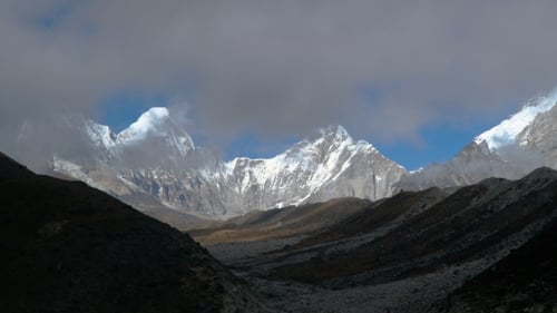 Majestic Snow-Capped Mountains in Rugged Wilderness