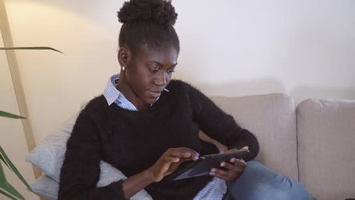 Female Use Touch Screen Device in Flat