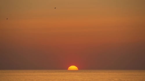 Clásica puesta de sol en el mar