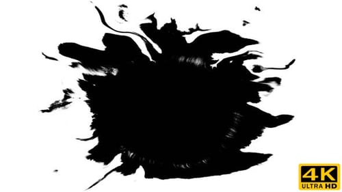 Black Inkblot Spreads Across White Background