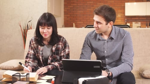 Young People Studying Together in Home Setting