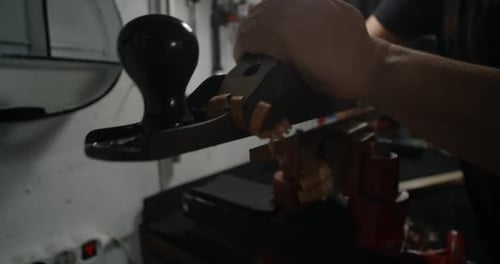 Luthier Uses Hand Plane for Wood Processing at His Workshop