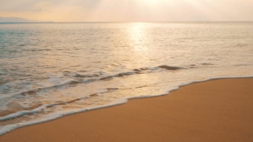 Sunset on the Beach, Idyllic Scene of a Golden Sunset Over the Sea