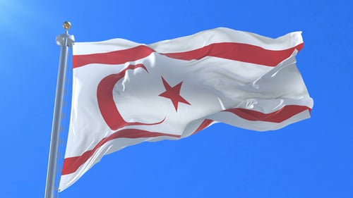 Waving Flag of Northern Cyprus on Clear Blue Sky