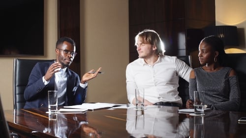 Businesspeople Meeting at a Modern Conference Table