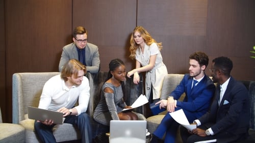 Diverse Team Meeting in Modern Office Space