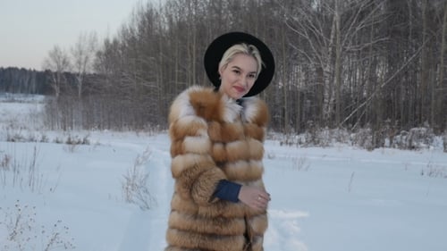 The Girl in the Winter at Sunset