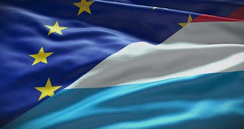 Waving European Union and Luxembourg Flags