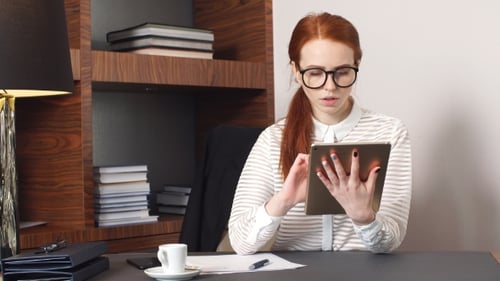 Young Successful Businesswoman Using Tablet at Home Living Room Home Office.