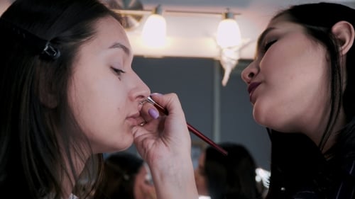 Stylist Makes Makeup for Female Models
