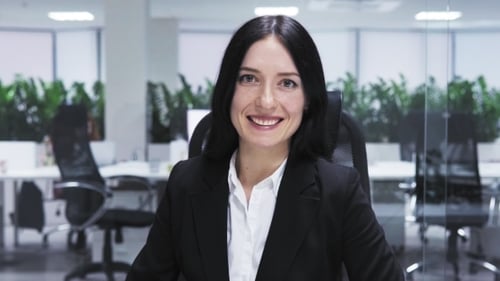 Happy Business Woman in Office