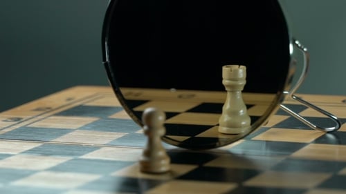 Chess Pawn and Rook Reflection in Mirror