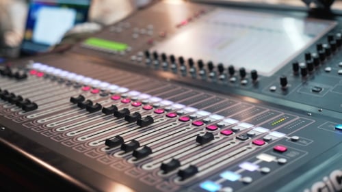 Audio Mixer in a Studio the Automatic Soundboard Knobs Moving