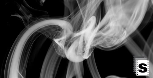 White Smoke Swirling on Black Background
