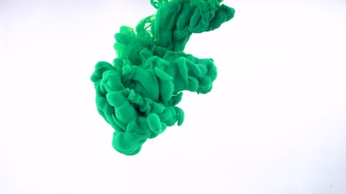 Green Ink Flowing Through Water In