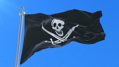 Jolly Roger Flag Waving with Blue Sky Background