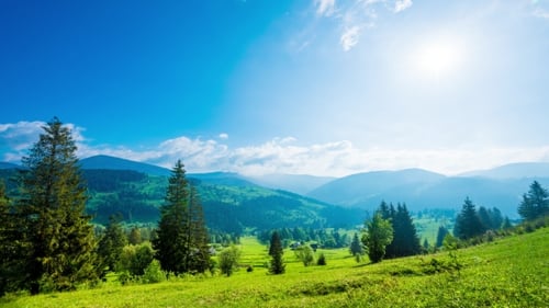 of Blue Sky with Clouds Over Mountain