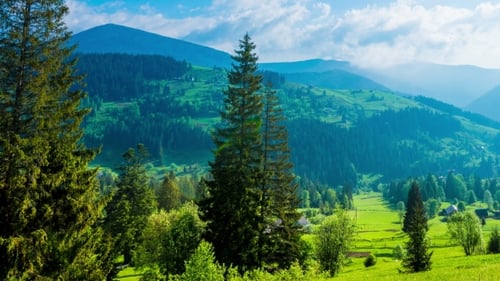 of Blue Sky with Clouds Over Mountain