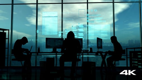 Futuristic Holographic UI Displaying Code and Data in Corporate Office