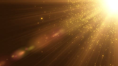 Bright Golden Light Rays with Sparkling Particles Overlay