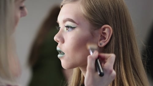 Fashion Makeup. Woman with Colorful Makeup and Body Art