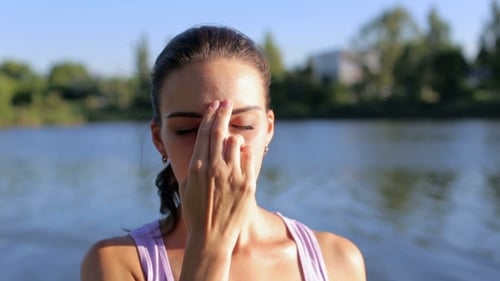 Girl Practicing the Breathing Technique in Yoga