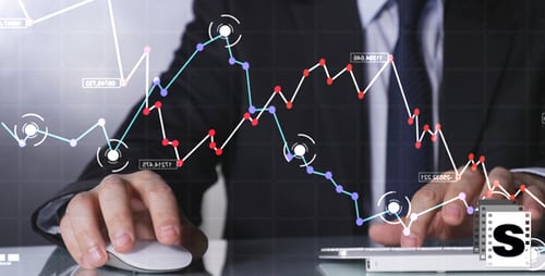 Businessman Looking Sales Charts